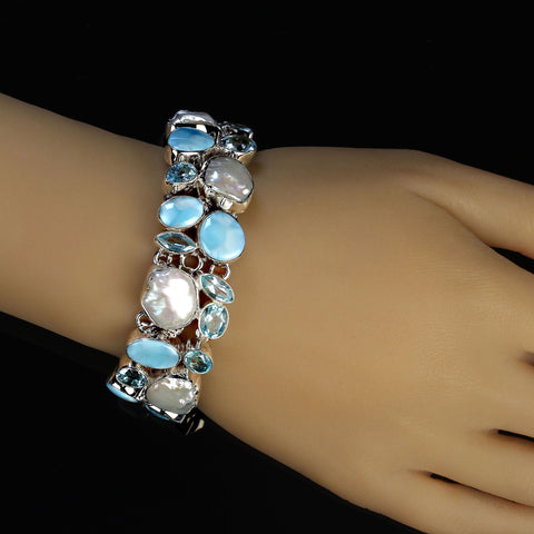 Magnificent bracelet of Biwa Pearl, Blue Topaz, and Larimar Bezel set in Silver
