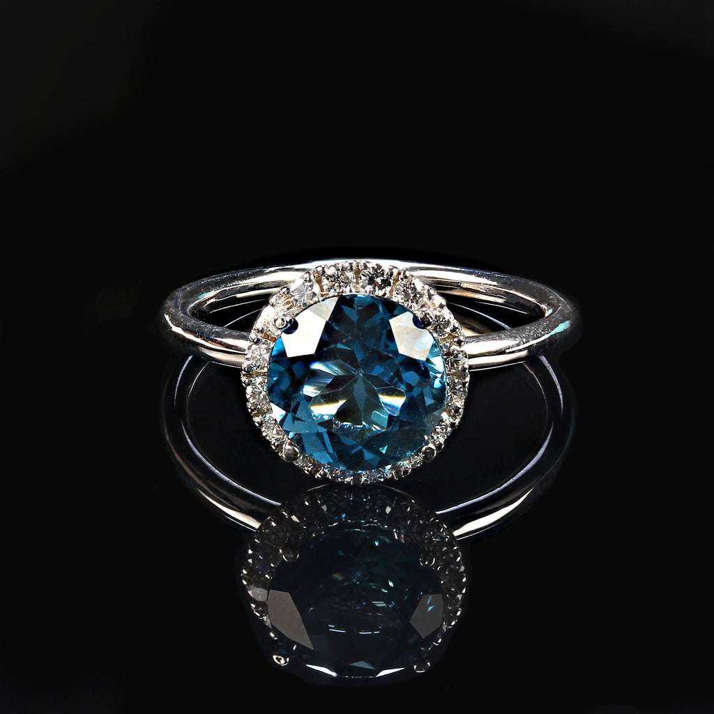 Unique and delightful Blue Topaz and Diamond 14K White Gold Ring