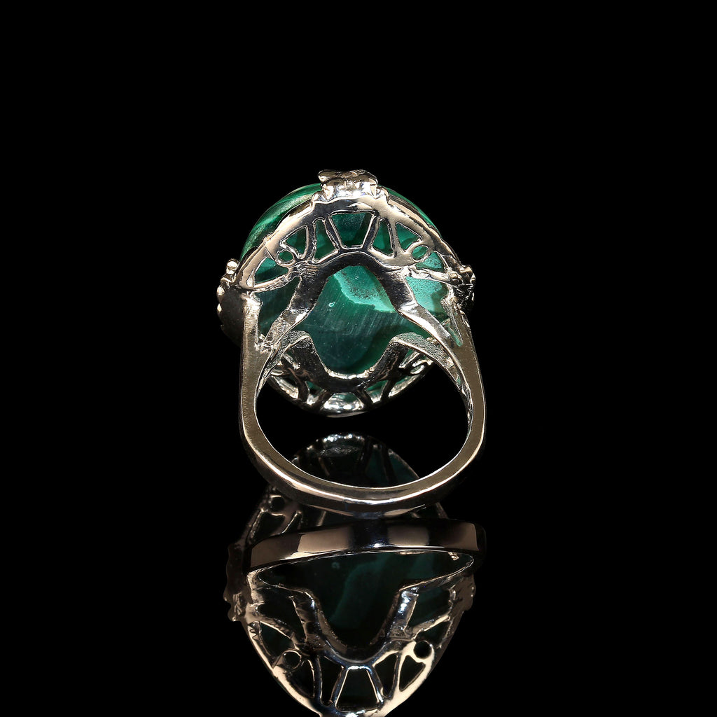Oval Malachite cabochon in handmade 14K white gold ring
