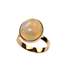 Delightful Round Opal in 18KT Gold Ring
